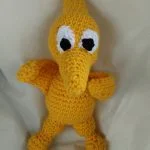 a yellow crochet Pteryadactyl