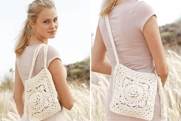 a woman wearing a crochet bag in a white color and flower design