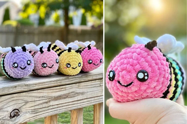 A collection of colorful crocheted bee toys displayed on a wooden surface with one being held up against a blurred natural background.