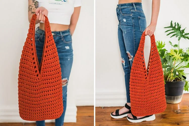 a woman holding an orange crochet bag