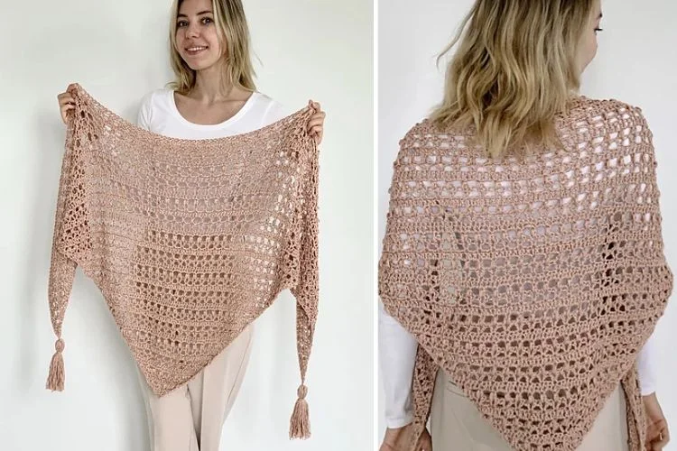 a pink triangle crochet shawl with two tassels