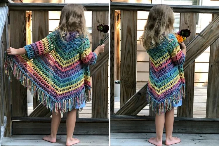 a little girl wearing a colorful crochet cardigan with tassels