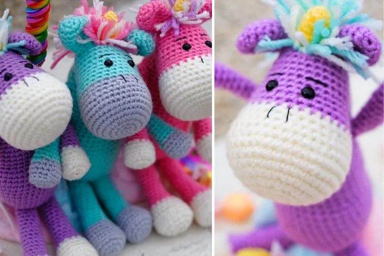 Colorful crocheted unicorn toys with a focus on one in the foreground.