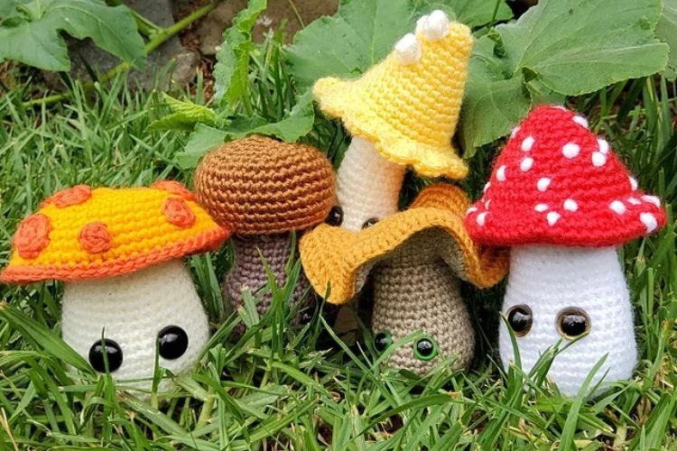 a collection of mushroom crochet amigurumi