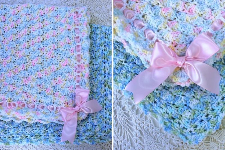 a cute crochet baby blanket with a ribbon bow