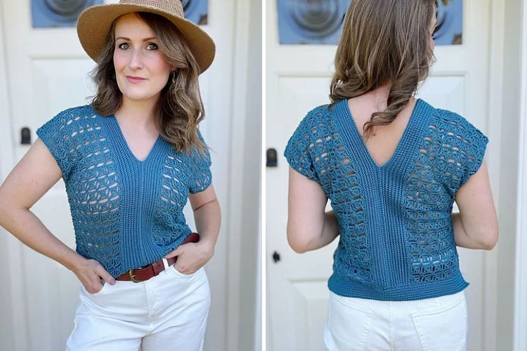 a woman wearing a short-sleeved lace crochet top in blue