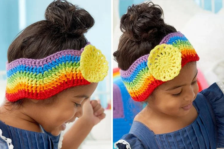 a little girl wearing a crochet headband in rainbow colors