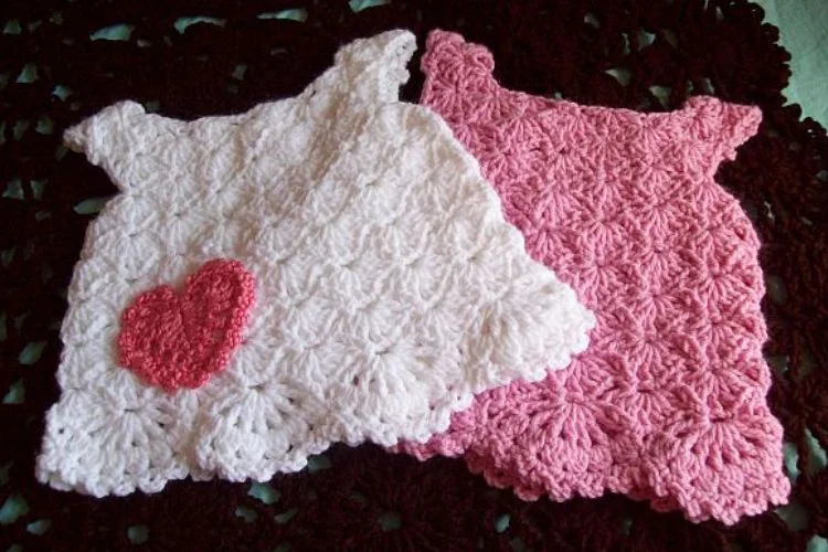 crochet baby dresses in white and pink