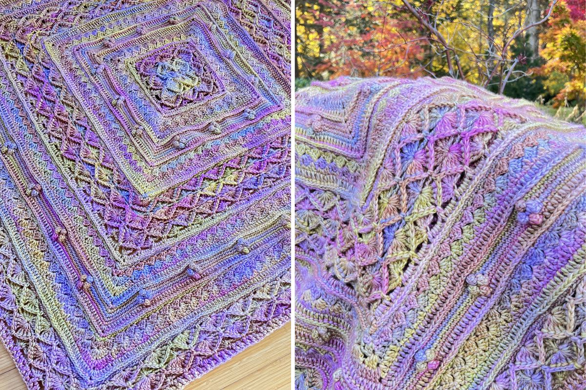 Close-up of a colorful, textured Orbs blanket with intricate crochet patterns and a mix of pastel hues, displayed outdoors with foliage in the background.