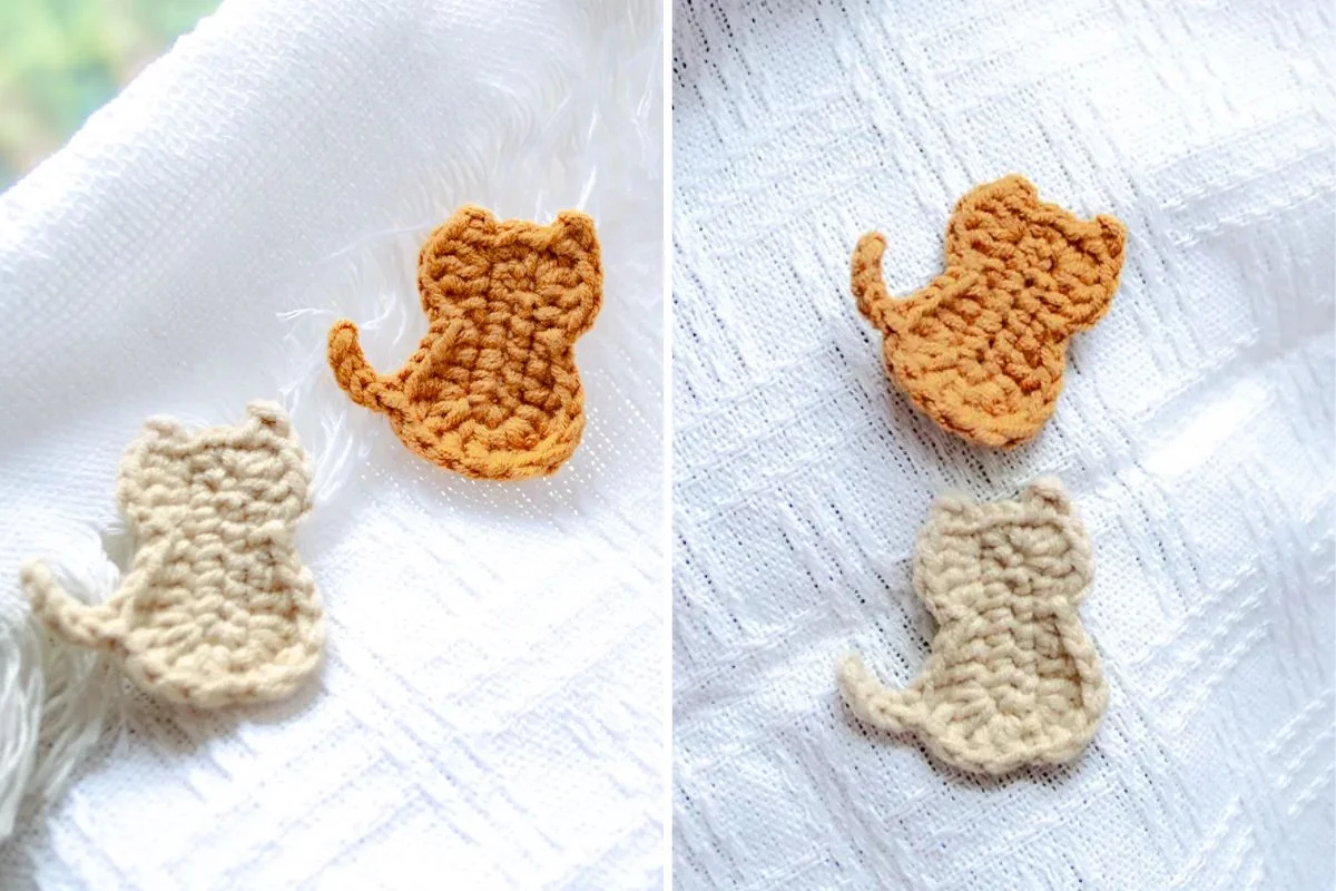 Two crocheted cat appliques, one orange and one beige, rest on a textured white fabric—a perfect project for beginners.