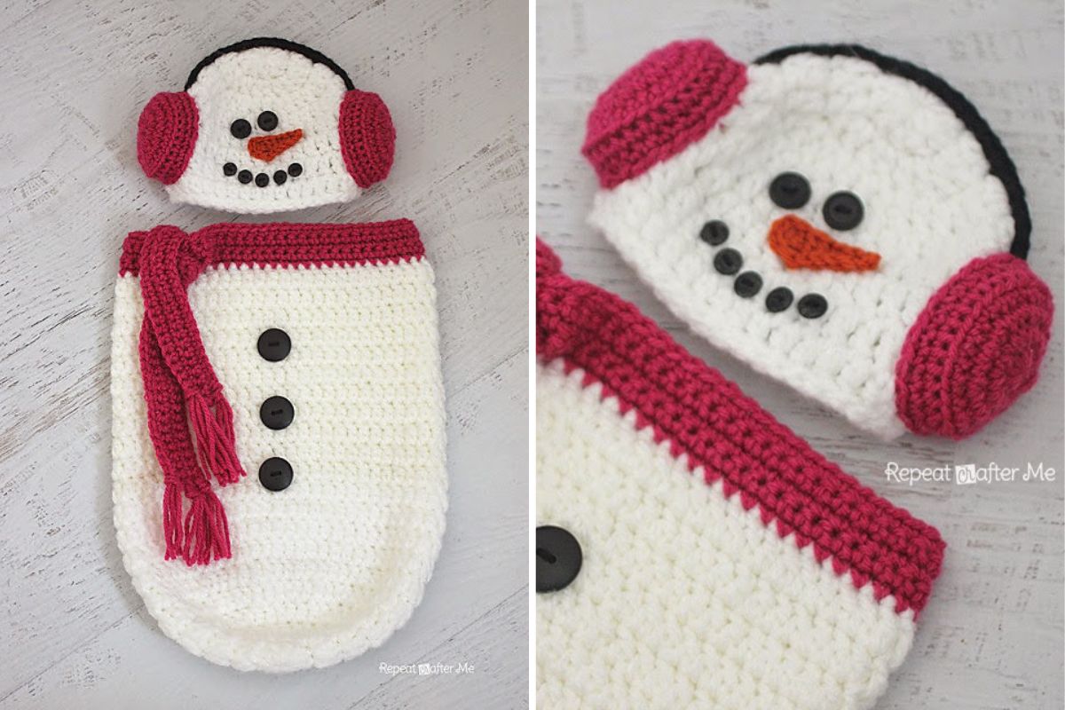 Crocheted snowman-themed cocoon and hat set resembling a baby onesie, complete with pink earmuffs, black buttons, and a red scarf detail.