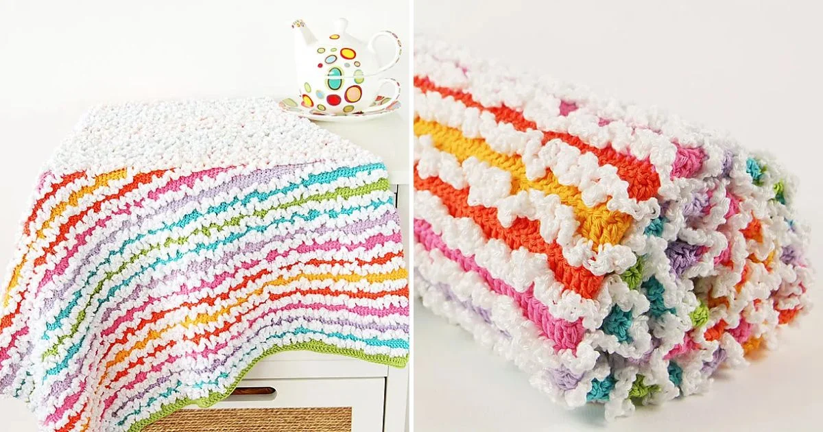 Rainbow Spring Ruffle Blanket with multicolored stripes displayed on a white table, next to a teapot with a colorful pattern; a rolled-up view shown on the right. Perfect for those looking for a free pattern or tutorial to create vibrant decor.