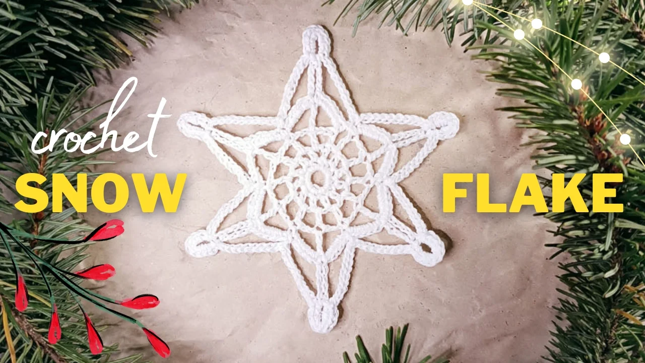 Noelle Crochet Snowflake delicately crafted on a beige background, surrounded by vibrant greenery and red berries, with the words "crochet snow flake" elegantly displayed in yellow.