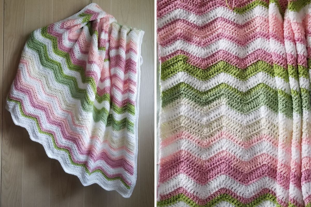 A crocheted blanket with a zigzag pattern in white, pink, and green colors on a wooden floor. Close-up shows the textured stitches and color gradient detail.