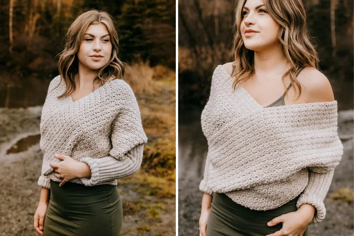 A woman outdoors wears a cozy gray crochet sweater with long sleeves and a green skirt, standing by a body of water framed by trees.