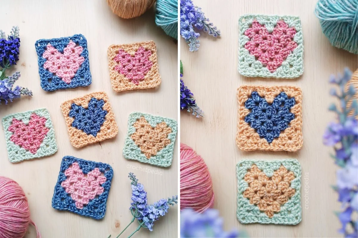 Crochet heart granny squares in pink, blue, peach, and green yarns are beautifully arranged on a light wooden surface.