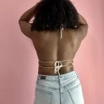 back of a woman wearing crochet top