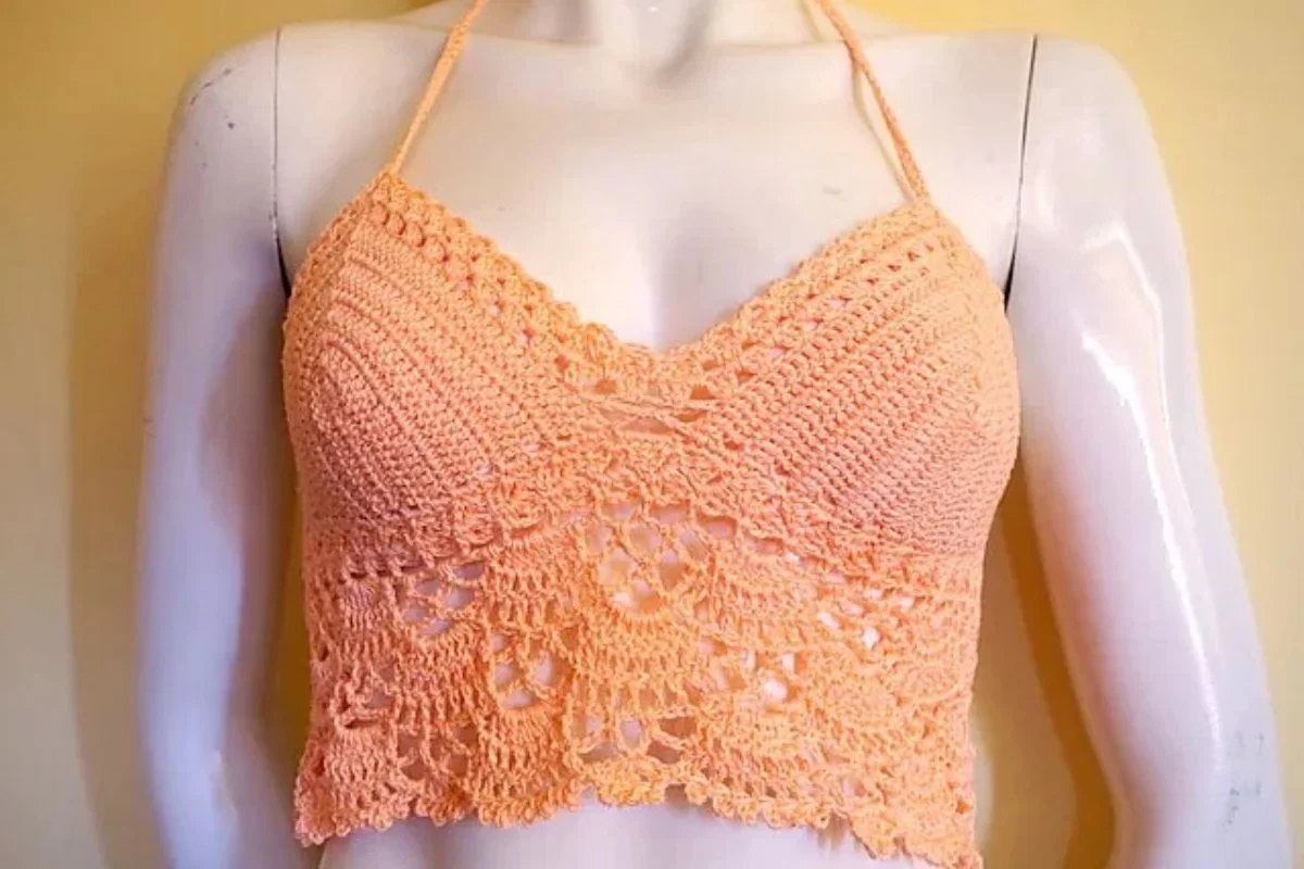 a lace crochet halter top in a peach color