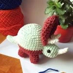a crochet amigurumi dinosaur
