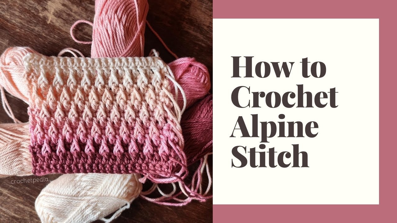 a crochet swatch featuring apline stitch texture in pink ombre colors