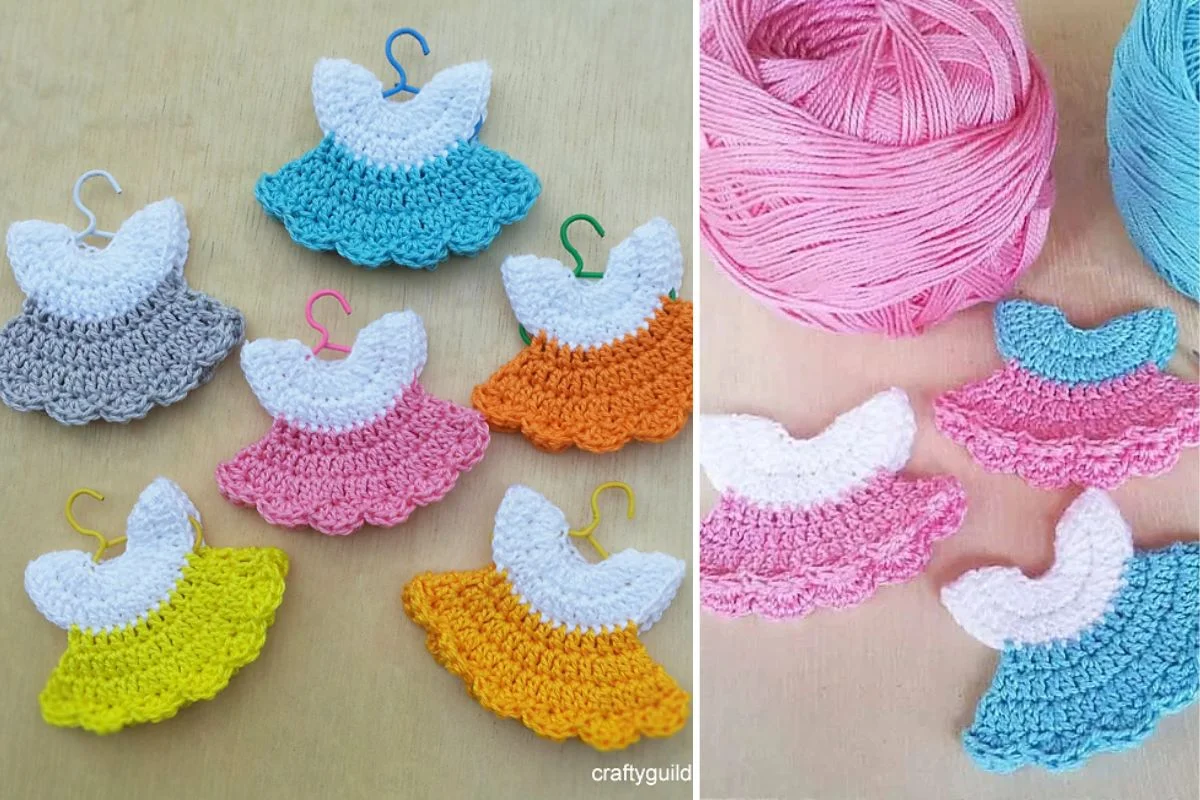 Crocheted mini dress-shaped ornaments in various colors are displayed on a flat surface, with yarn balls and crochet hooks beside them.