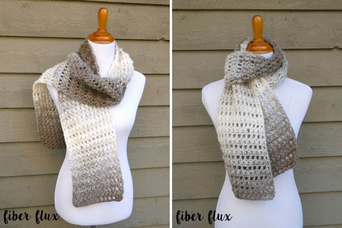 A white mannequin displays a crocheted scarf in gradient shades of cream, gray, and brown, shown from two different angles against a wooden background.