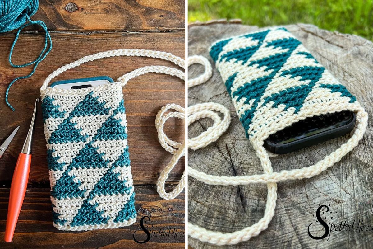 A crocheted phone pouch with a geometric blue and white pattern inspired by a Crocheted Snowman, featuring a long strap and a phone partially inside, displayed on a wooden surface.