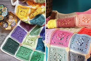 A multicolored crocheted blanket made of square patches with buttons, shown draped on a surface next to a tin of sewing buttons and thread.