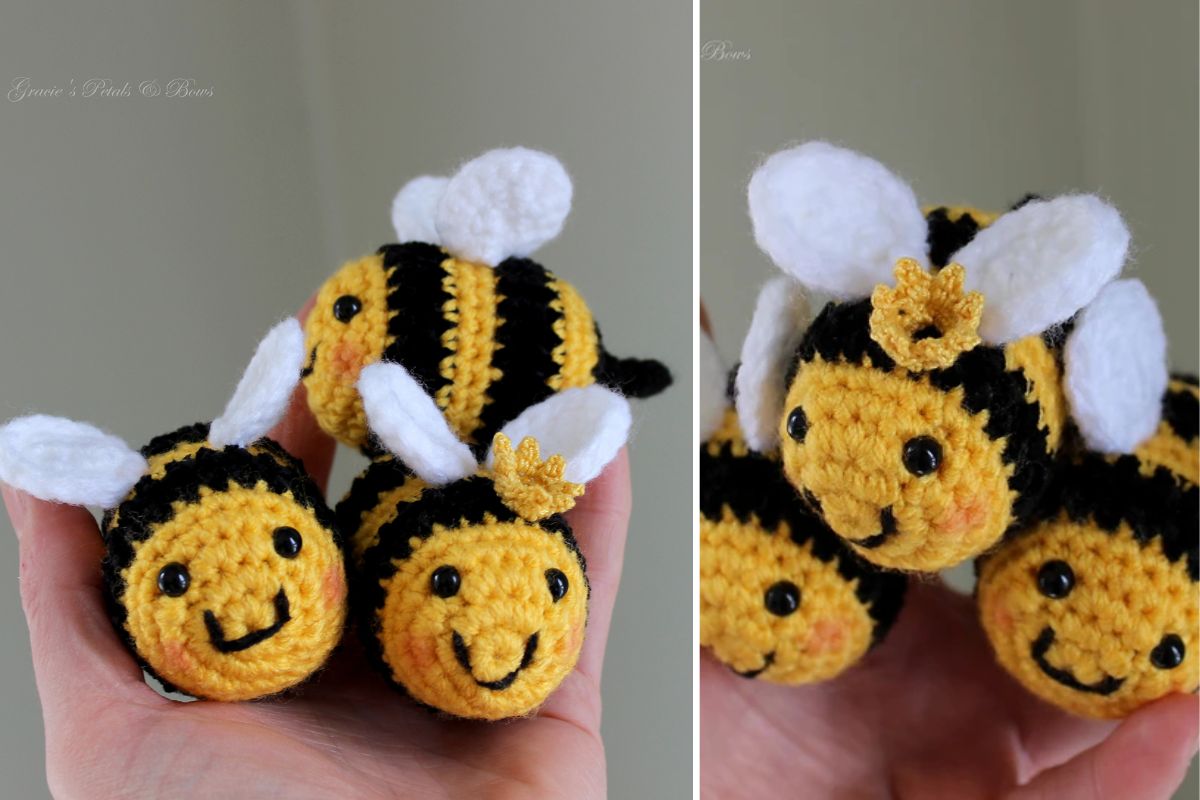 Close-up of three crocheted bee toys with black and yellow stripes, white wings, and small crowns, held in a person's hand.