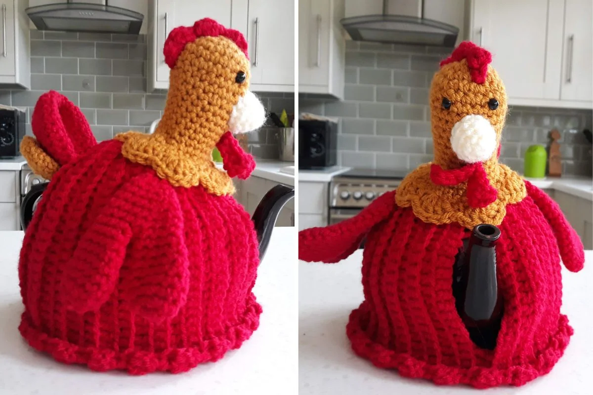 A crocheted tea cosy shaped like a red and yellow red rooster covers a teapot on a kitchen counter, shown from the side and front.