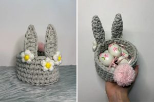 A gray crocheted basket with bunny ears, decorated with white and yellow flowers and a pink pompom, is displayed empty and filled with painted eggs—perfect for gifting alongside a Beach Day Cover-Up Tunic.