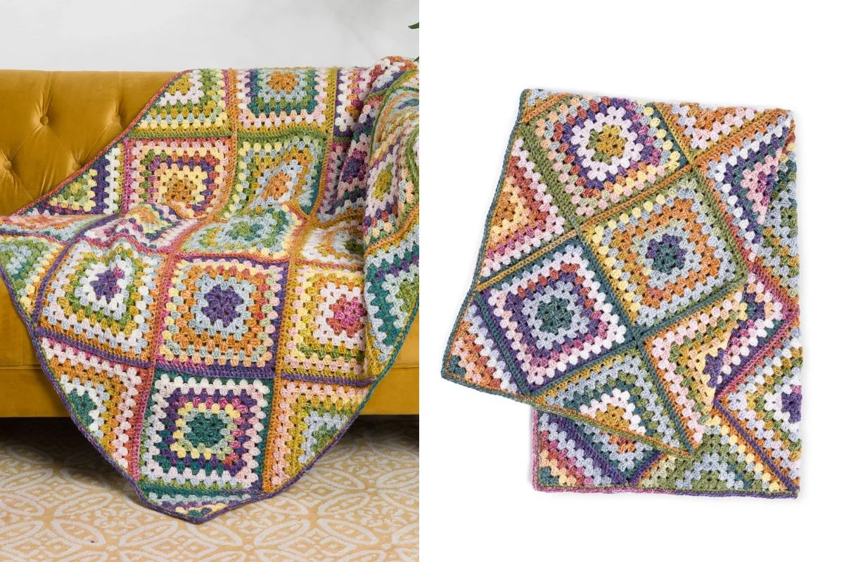 A multicolored crochet blanket with a granny square pattern is draped over a yellow sofa and displayed flat on a white background.