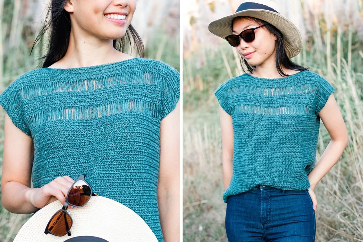 Woman wearing a teal crocheted top with horizontal openwork stripes, paired with jeans, sunglasses, and a wide-brimmed hat outdoors.
