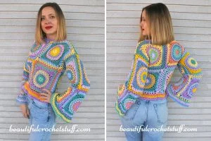 Woman wearing a colorful crochet sweater with square and circular patterns, posing front and back against a light brick wall.