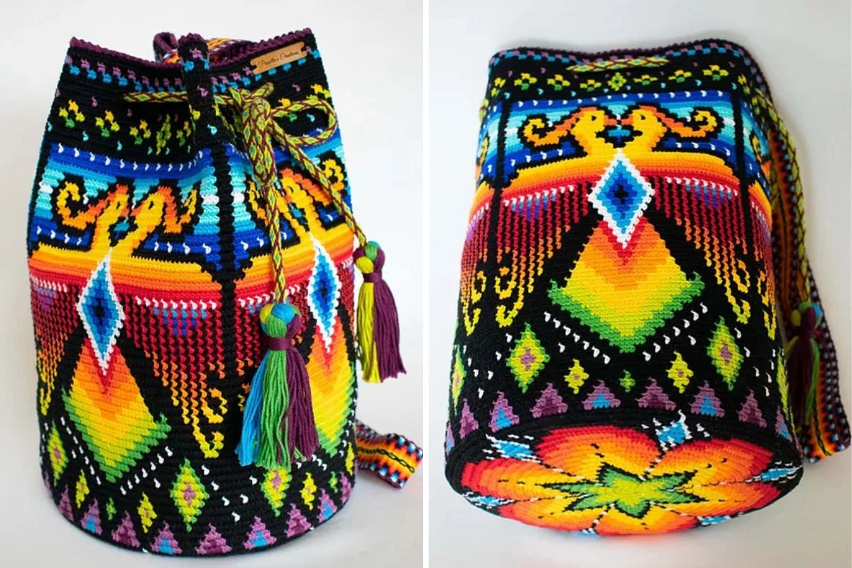 A colorful Birds Drawstring Bag with intricate geometric patterns in yellow, orange, blue, green, purple, and black, shown from the front and bottom views.