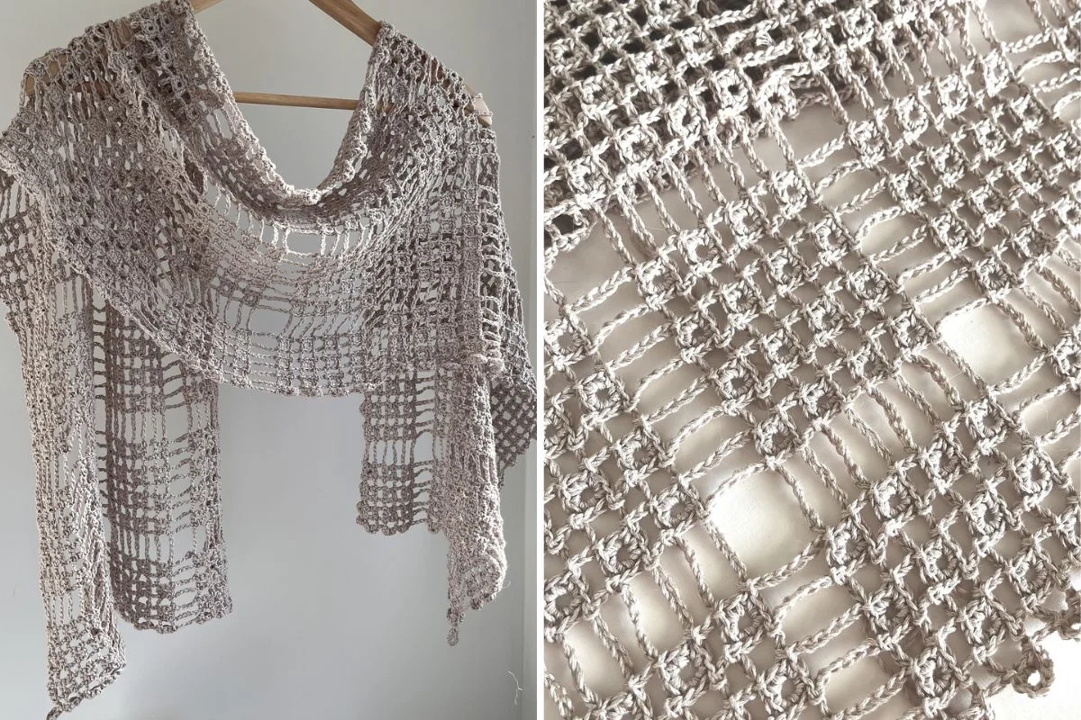 A crocheted mesh McLace Shawl in light beige hangs on a wooden hanger; close-up shows the open, grid-like stitch pattern of the yarn.