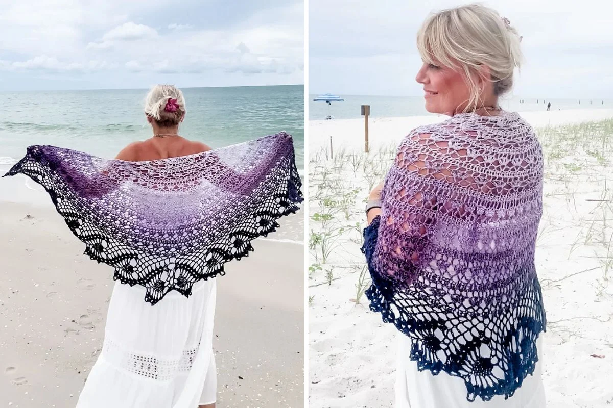 Woman in a white dress on a beach displays a purple and black crocheted shawl, shown from both the back and side.