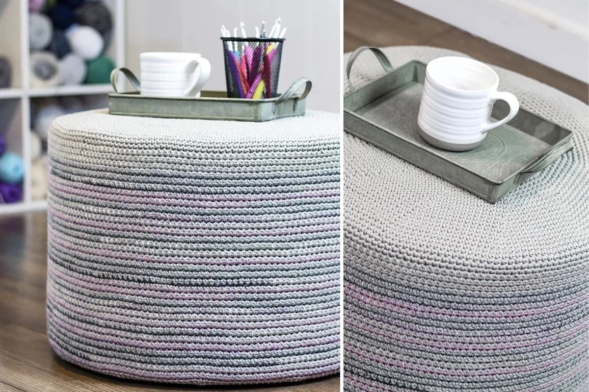 A round, crocheted floor pouf ottoman in shades of gray, reminiscent of a mosaic pattern, with a tray on top holding a white mug and a cup of pens, shown from two angles.