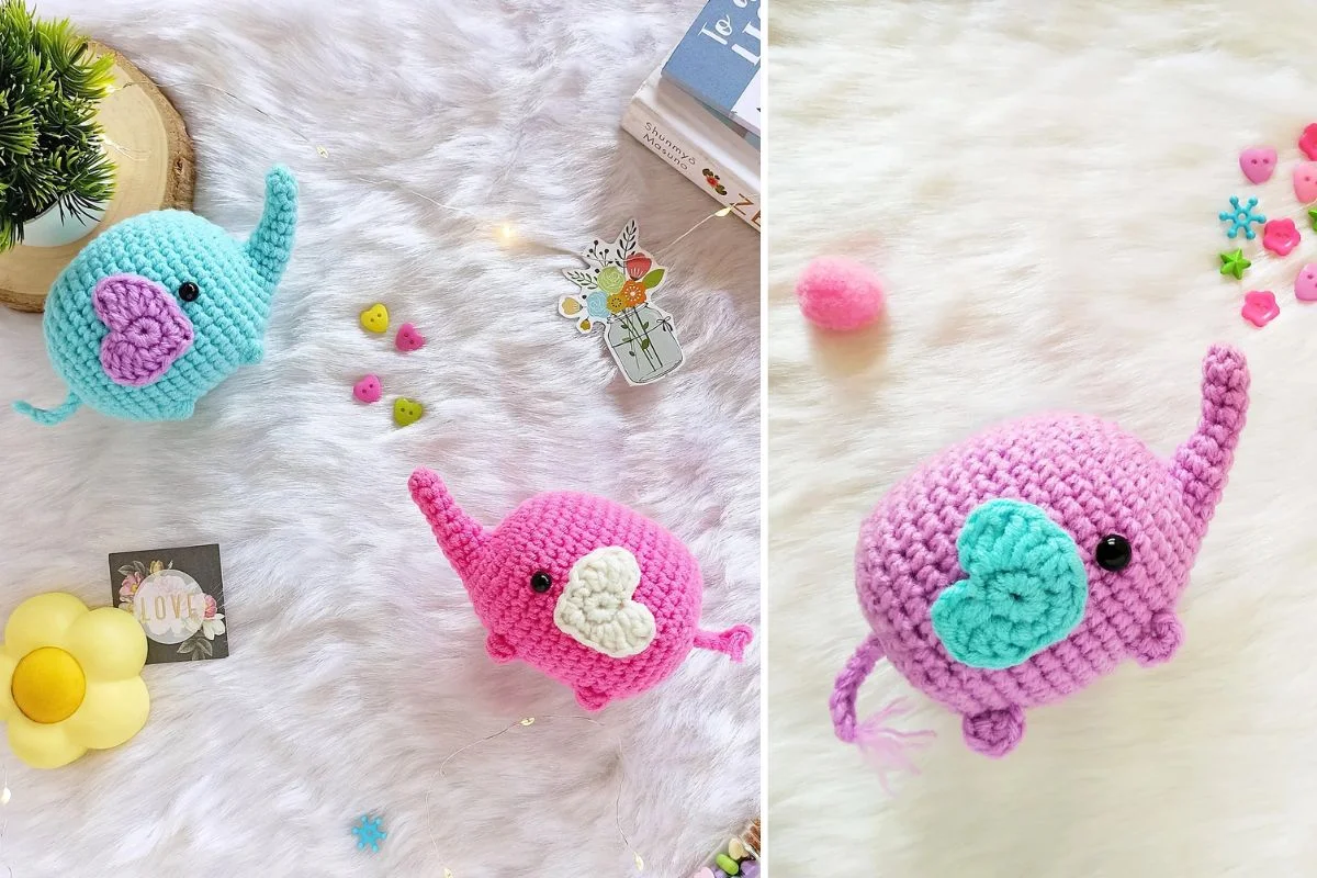 Three crocheted elephant toys in blue and pink, displayed on a fluffy white surface.