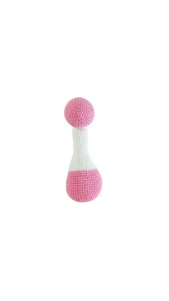 Pink and white crocheted baby rattle styled like a pumpkin crochet pattern.