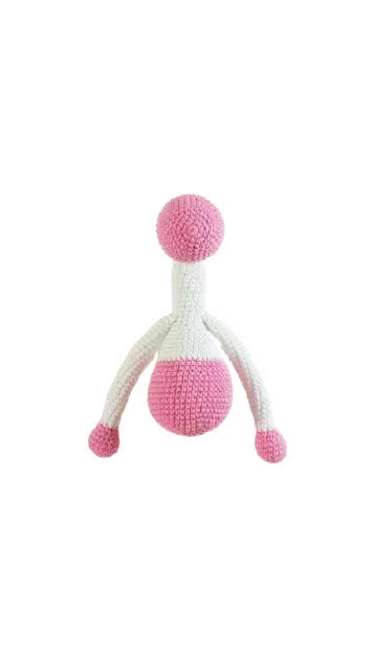 Crocheted baby rattle in the shape of a pink and white abstract figure, crafted using a crochet pumpkin pattern style.