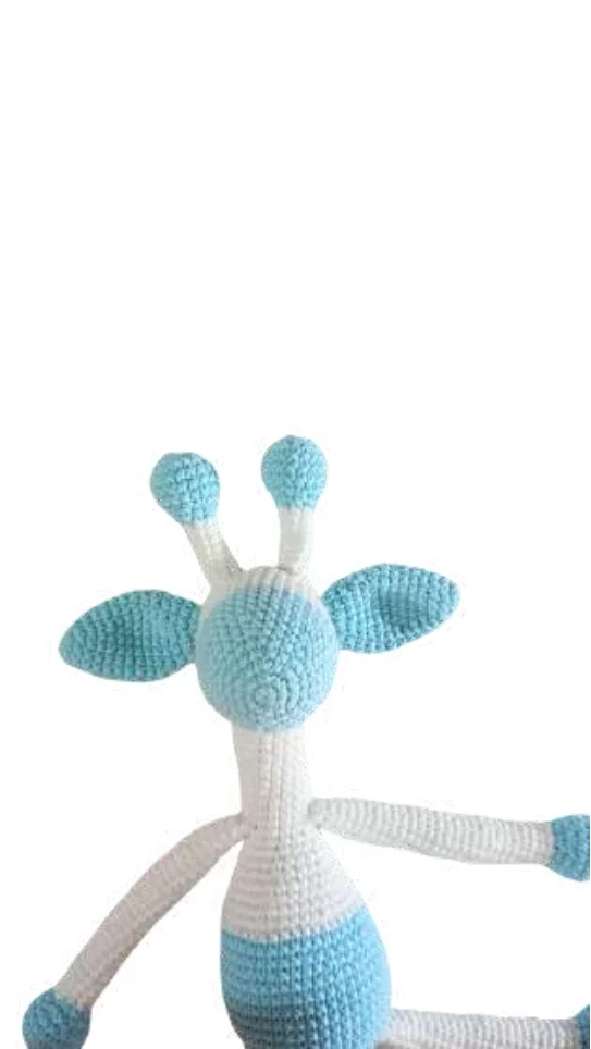 A white and light blue striped giraffe amigurumi crochet toy.