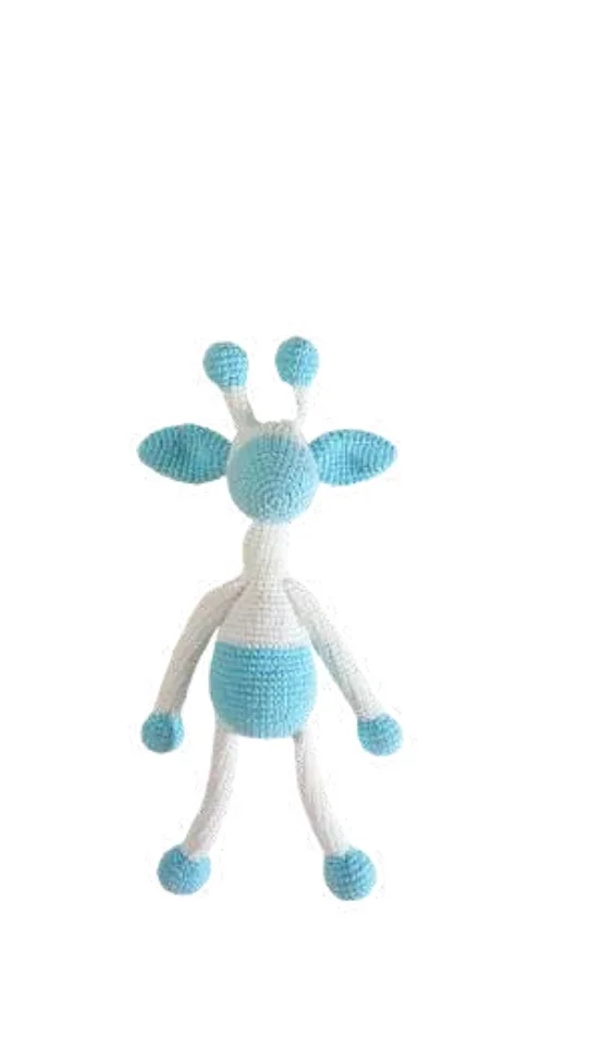 A giraffe amigurumi toy with a white body and light blue accents.